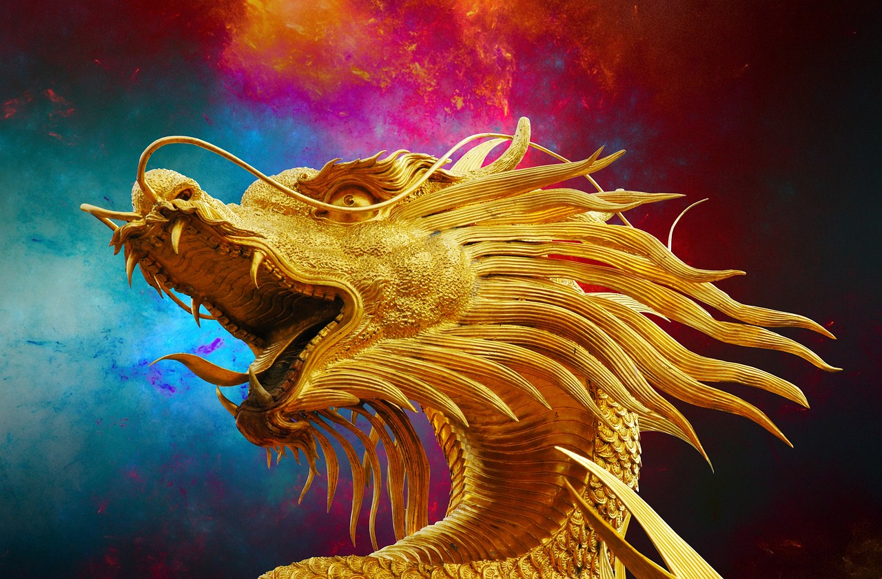 head of a golden dragon with a multi-colored background.
